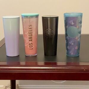 Starbucks 24 oz Venti Tumbler With Lids $13 each or all four $39